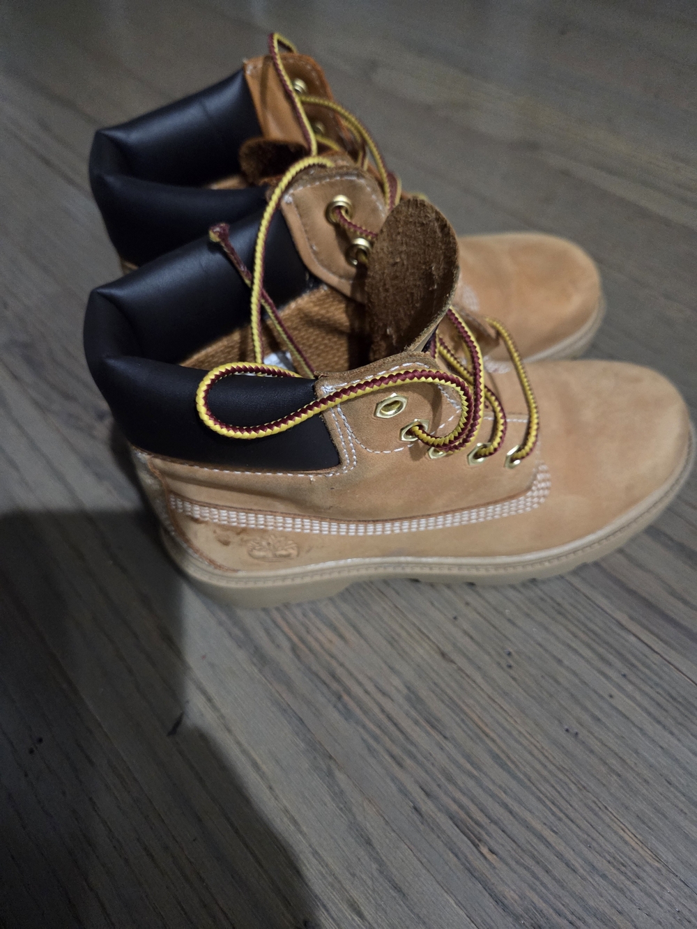 Timberland Kids Wheat and Black Padded-Collar Boots with Yellow-Red Laces